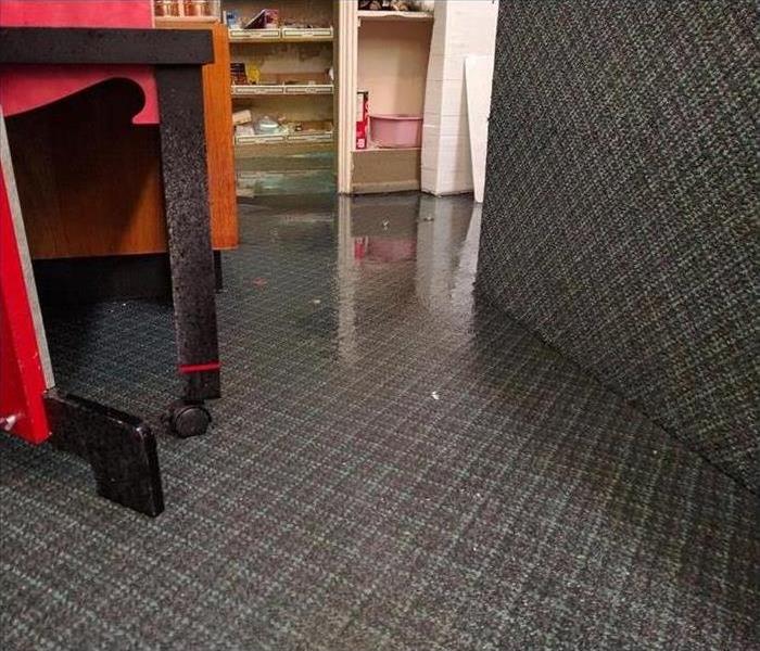 water soaked commercial grade carpeting