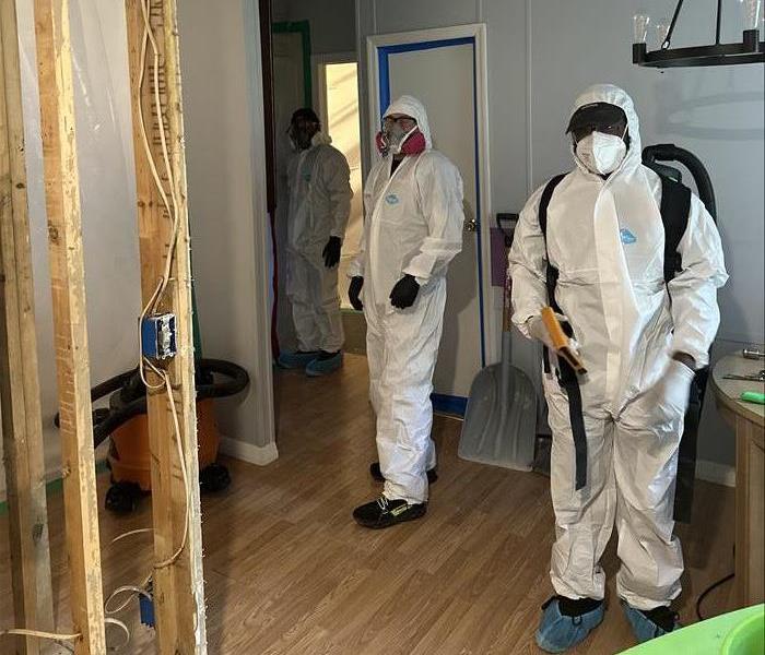 SERVPRO team in PPE at a biohazard job
